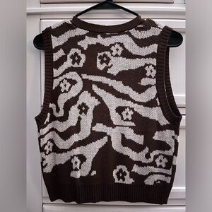 Women’s brown and white flower sweater vest